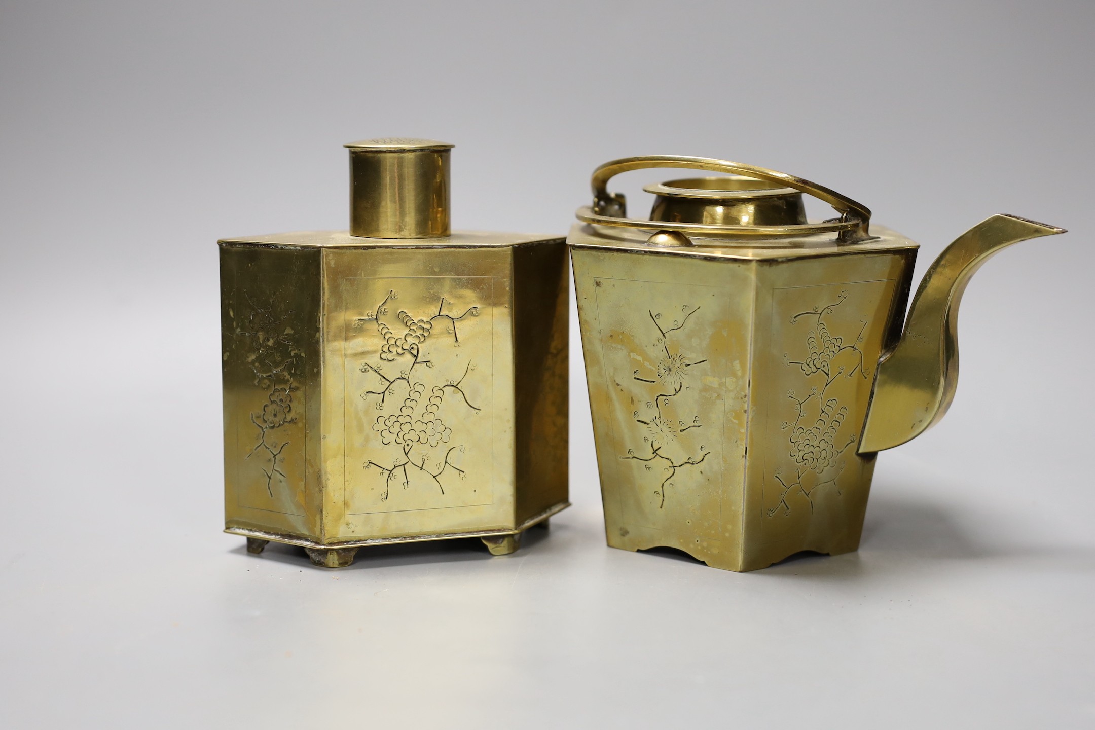 A Chinese brass tea caddy and kettle together with three similar blue and white porcelain bowls, three jars and covers and a Japanese vase